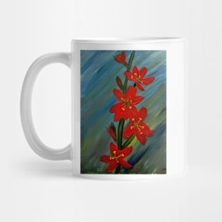 Red lillys growing wild in a field Mug